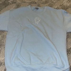 light blue smiley face crew neck